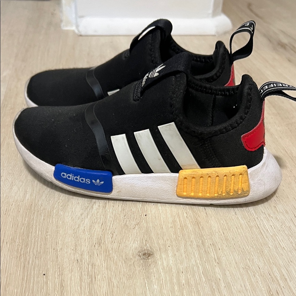 Adidas Kids Black Sneakers with Blue and Yellow Accents
